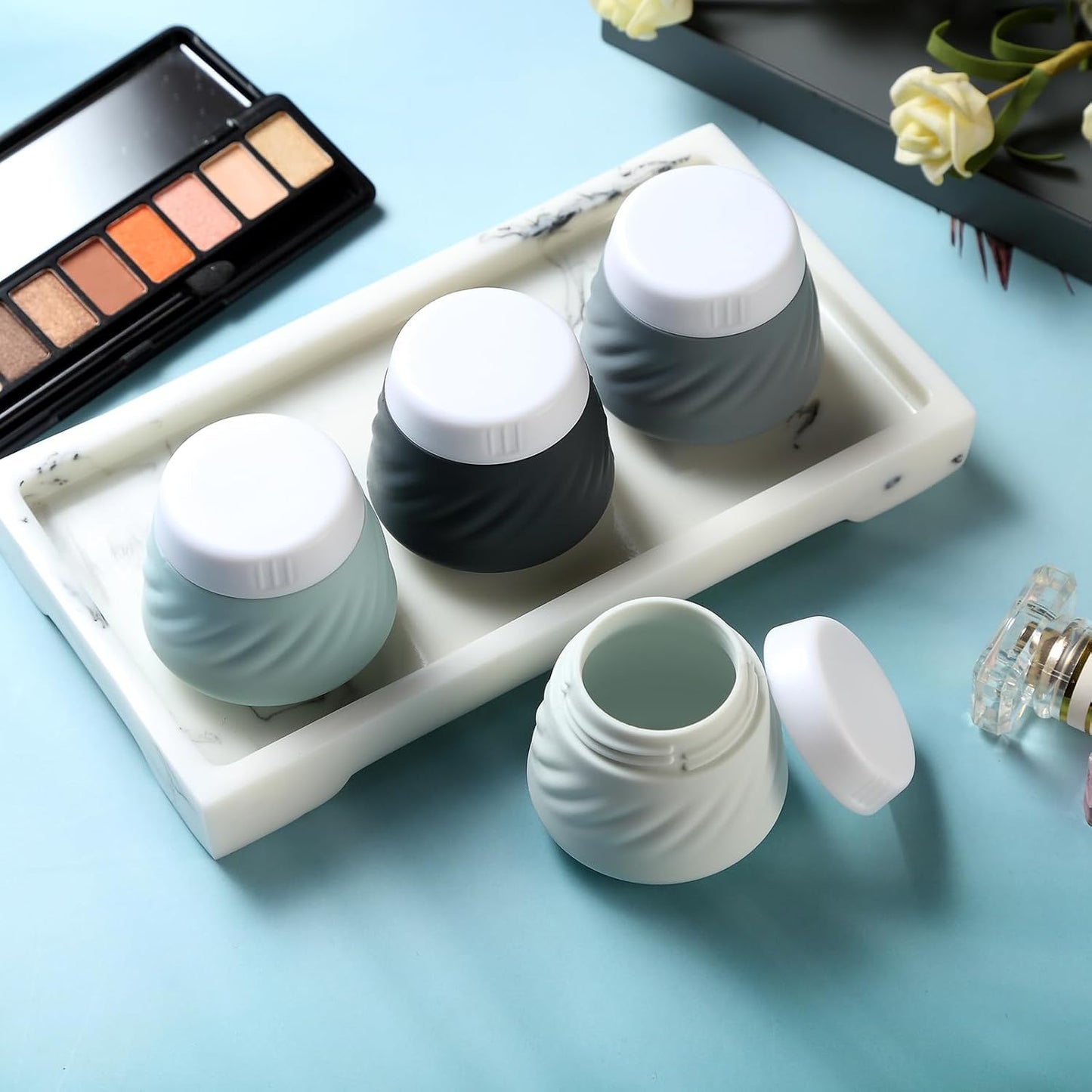 Gemice Silicone Cream Jars TSA Approved Travel Size Containers with Clear Bag, Leak-proof Travel Accessories with Lid for Cosmetic Face Body Hand Cream (4 Pack)