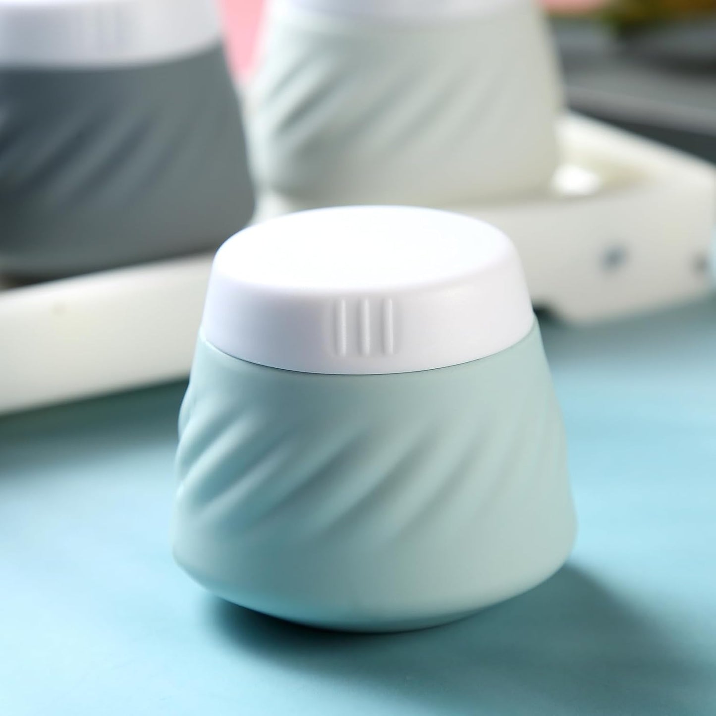 Gemice Silicone Cream Jars TSA Approved Travel Size Containers with Clear Bag, Leak-Proof Travel Accessories with Lid for Cosmetic Face Body Hand Cream (4 Pack)