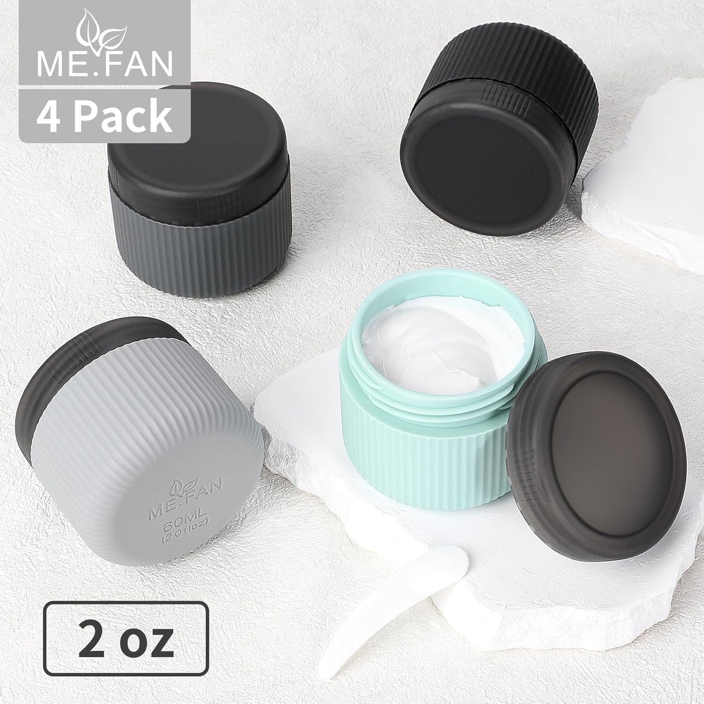 ME.FAN Travel Containers for Toiletries, TSA Approved 2 oz Silicone Cream Jars, Leak-proof Journey Containers, Trip Accessories with Lid for Cosmetic Face Hand Body Cream 4 Pack Black Lid Grey